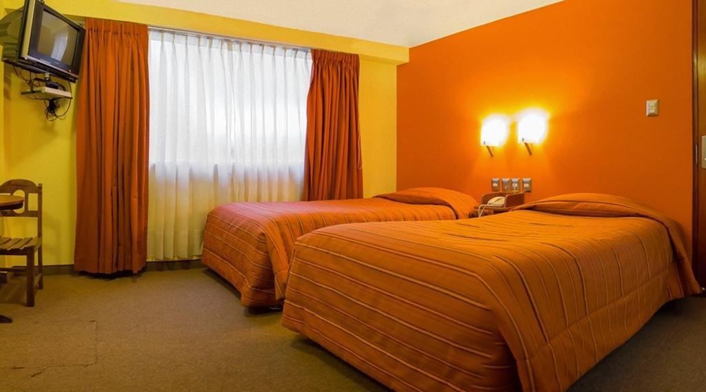 Mosoq Inn Puno Szoba fotó