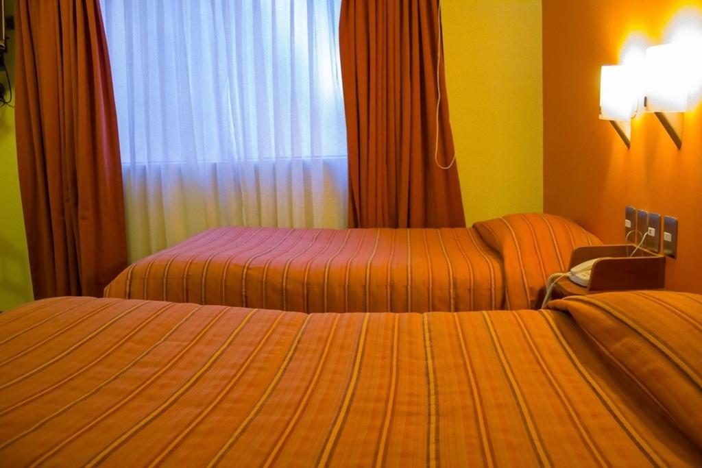 Mosoq Inn Puno Szoba fotó