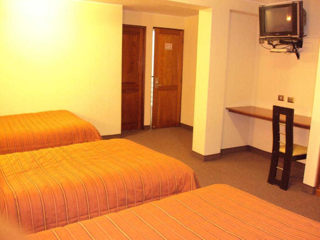 Mosoq Inn Puno Szoba fotó