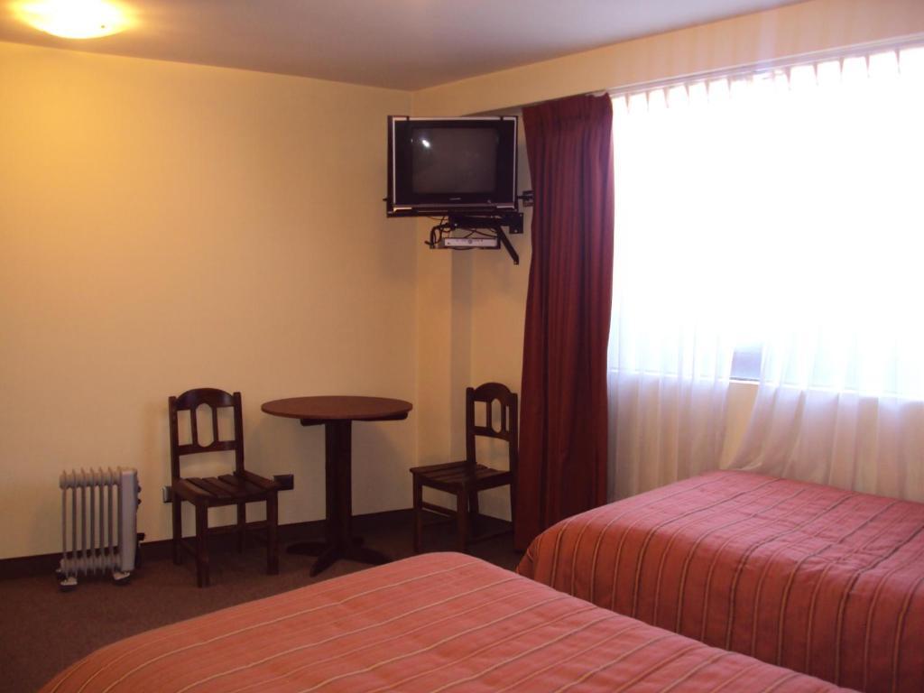 Mosoq Inn Puno Szoba fotó