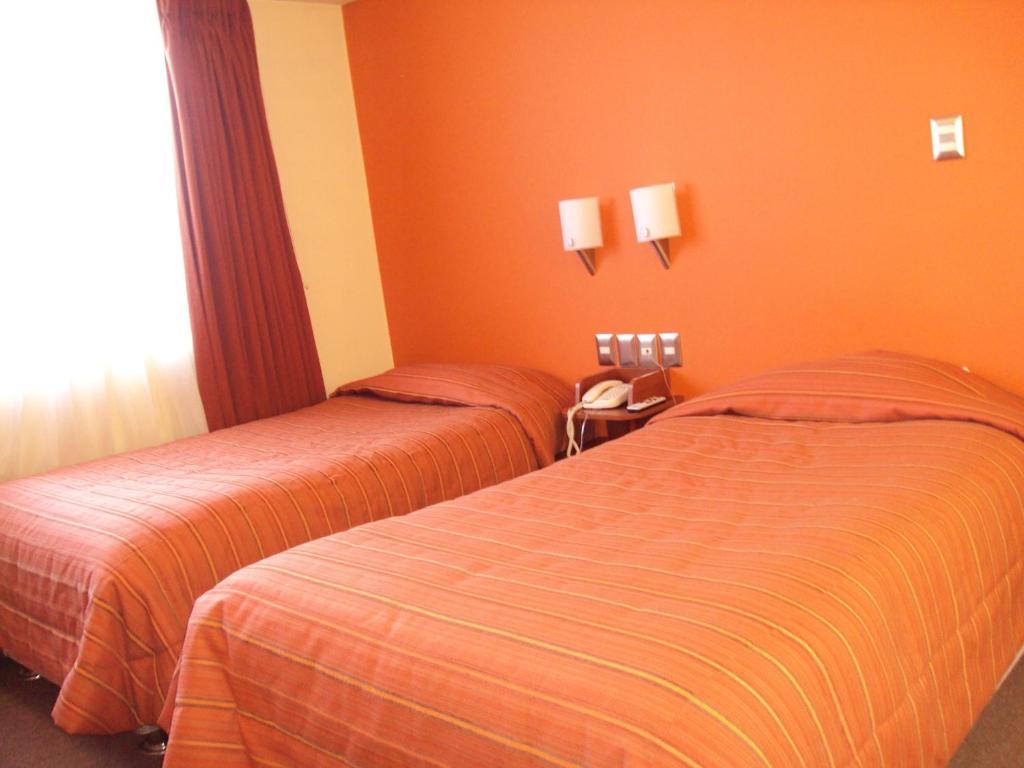 Mosoq Inn Puno Szoba fotó