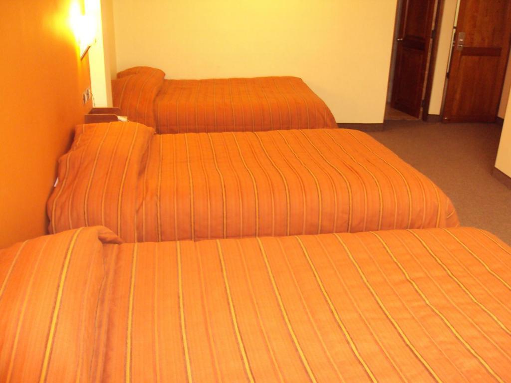 Mosoq Inn Puno Szoba fotó